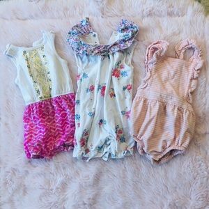 Three adorable rompers !! All 6-9 months in size.